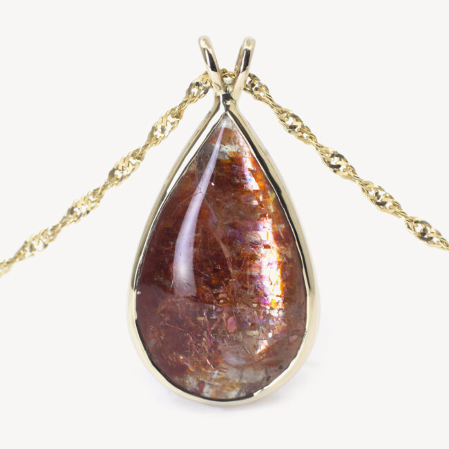 gold confetti sunstone pendant